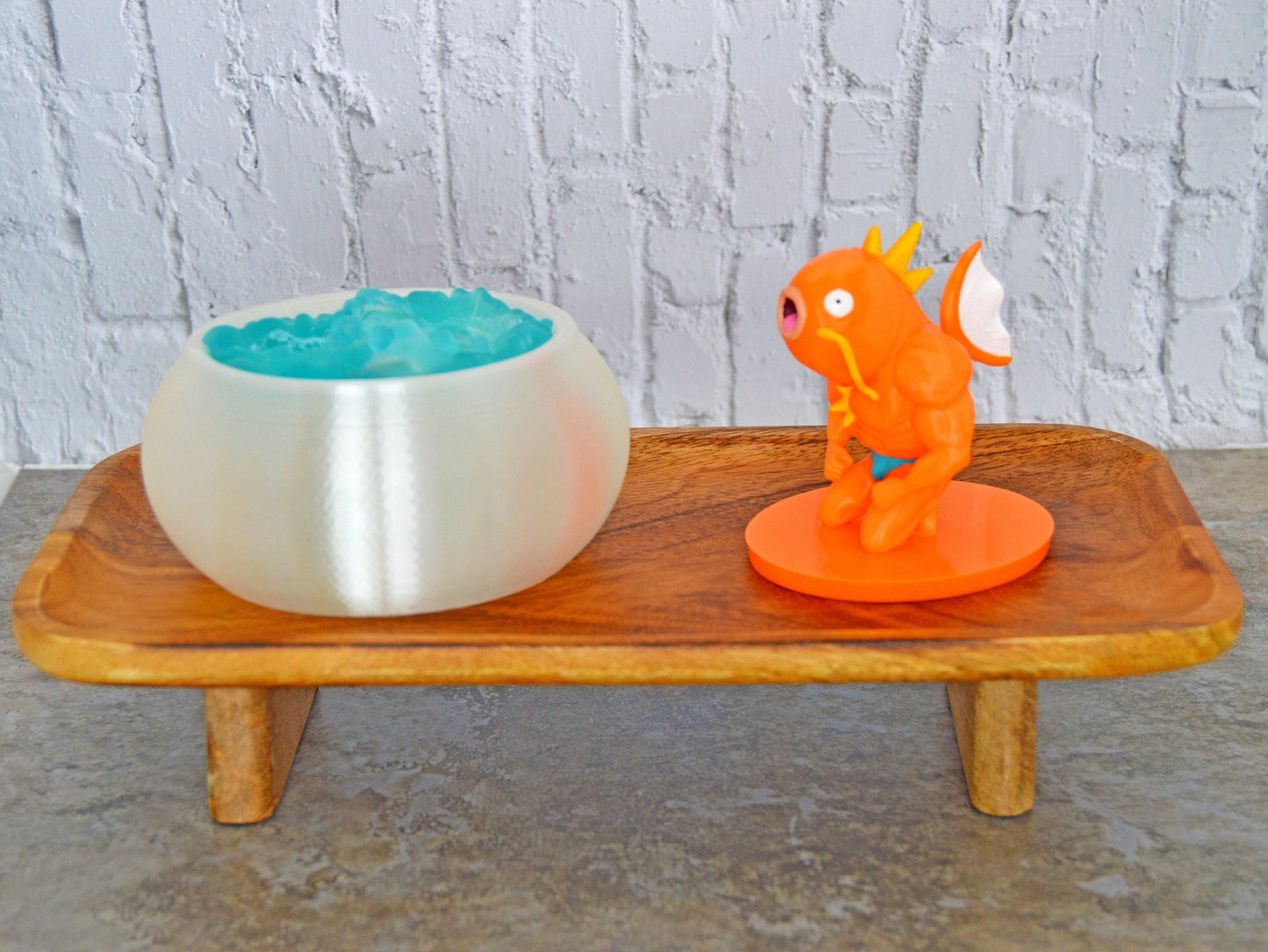 When you lift the bowl off of him, he transforms into a humanoid fish with big muscles!