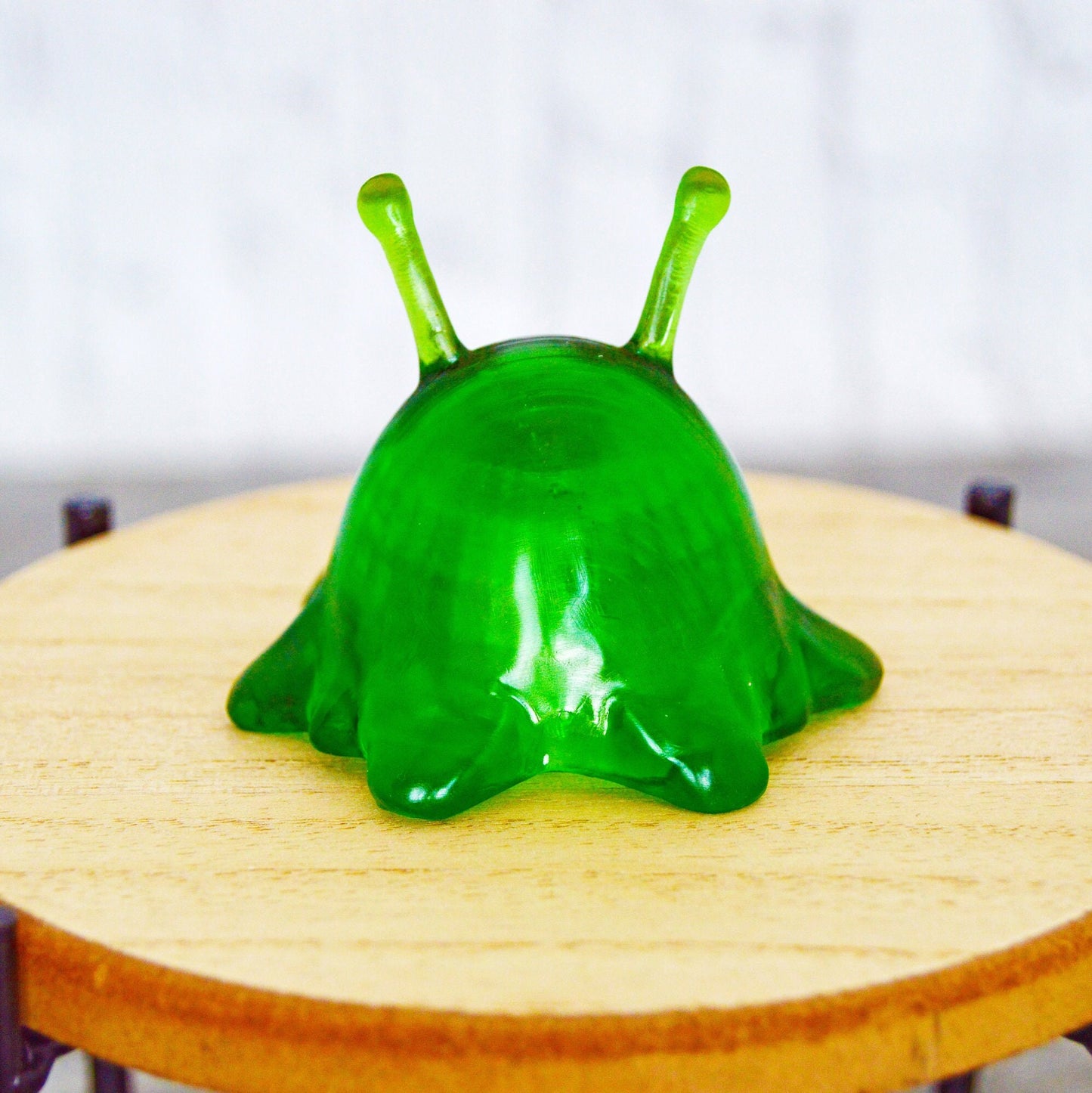 Here we see the back of the brain slug showing the beautiful translucent green resin that it is made of.