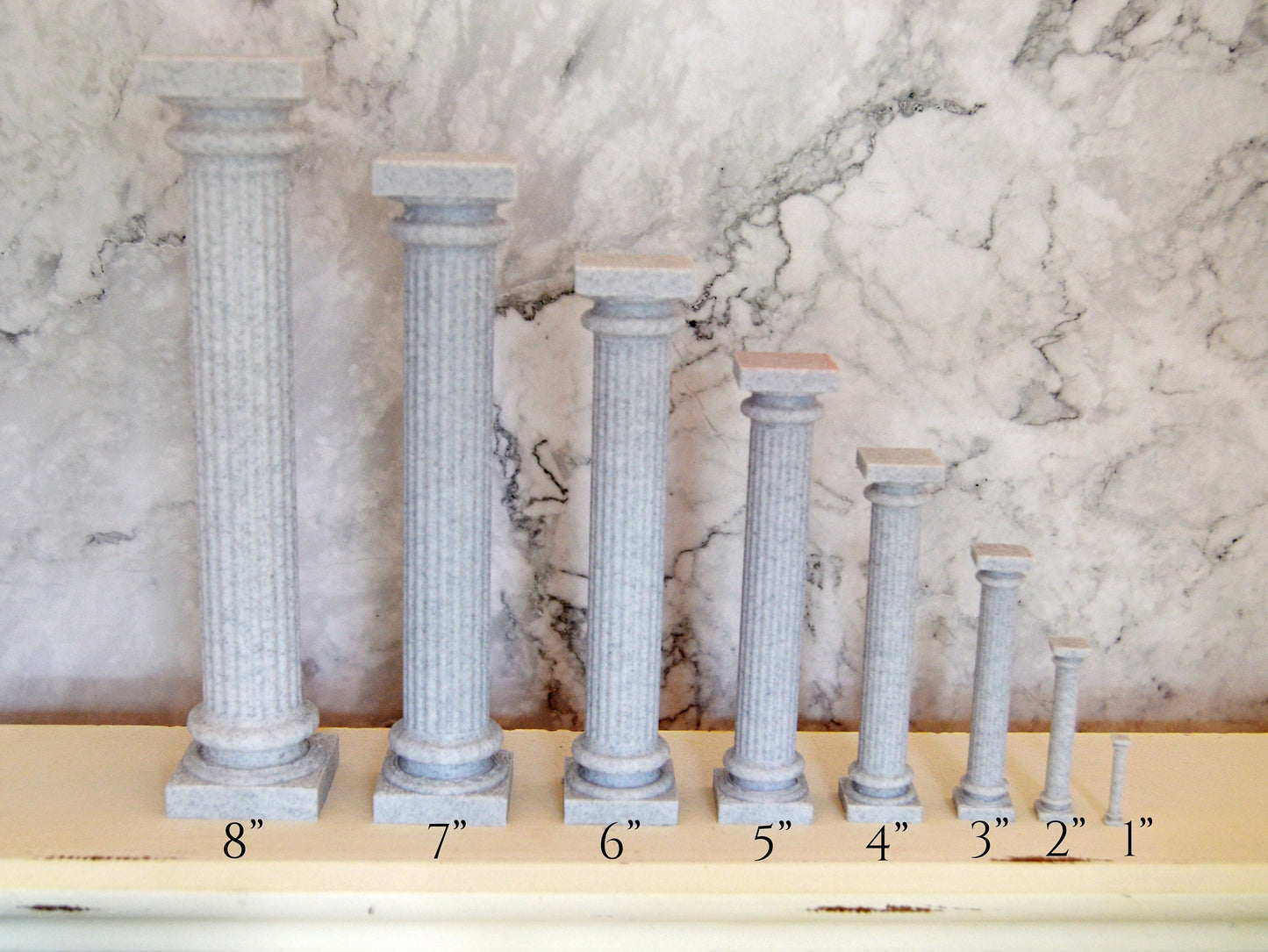 This picture shows eight different sizes of the Greek pillar we offer. The size starts at 1 inch and goes up to 8 inches in one inch increments.