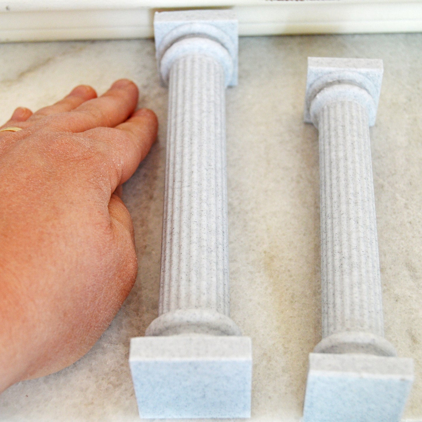 These are the two largest pillars with a woman&#39;s hand shown for scale.